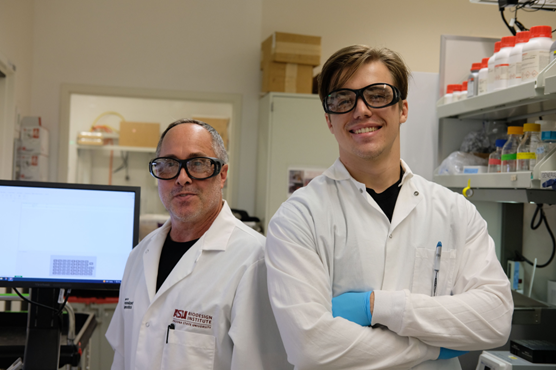 Two male DNASU scientists smiling. Photo courtesy of ASU Media Relations